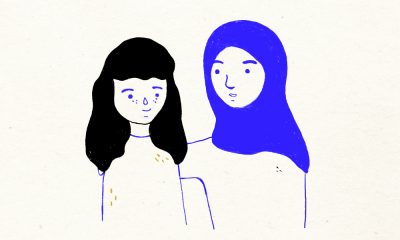 A line style illustration of a mother wearing a hijab stands with her arm around her daughter's shoulder. The lines are in blue and black, set against an off white background.