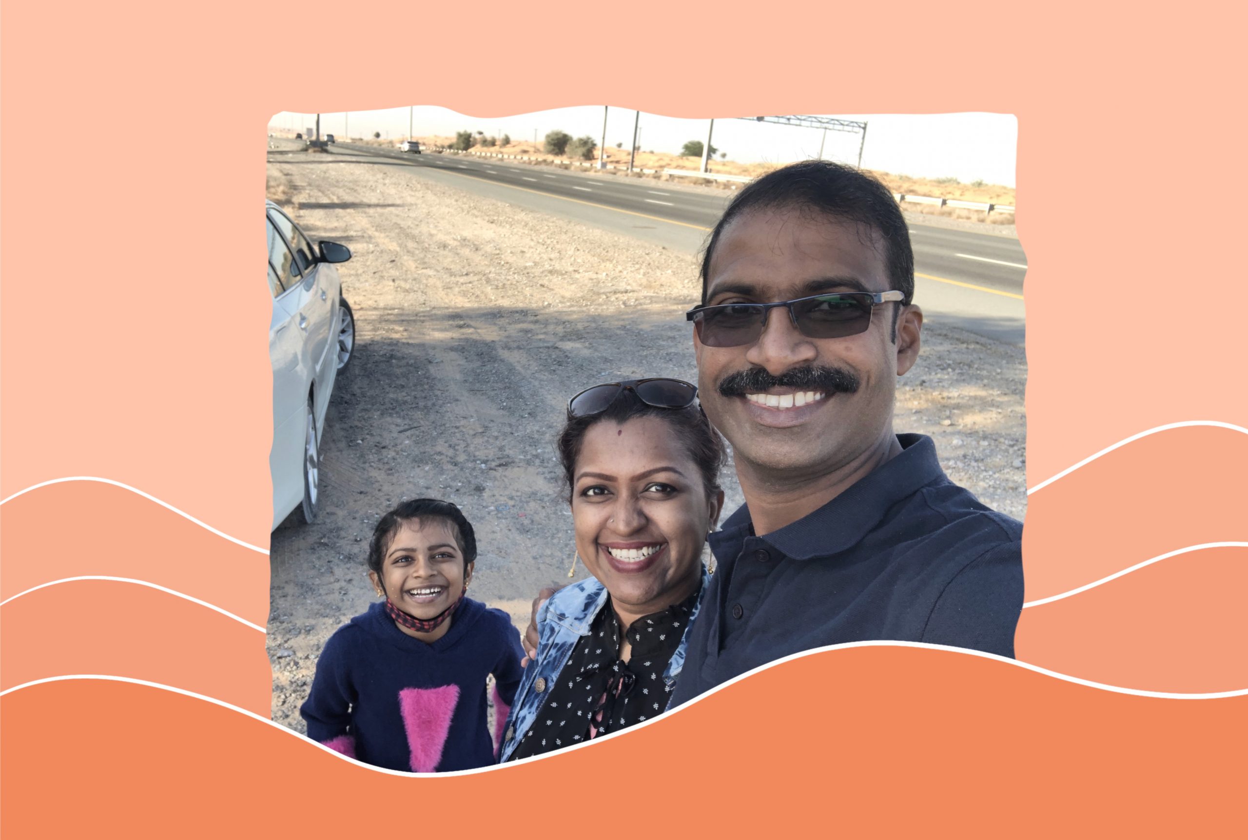 An image of Dhanya Sasidharan with her husband and her daughter.