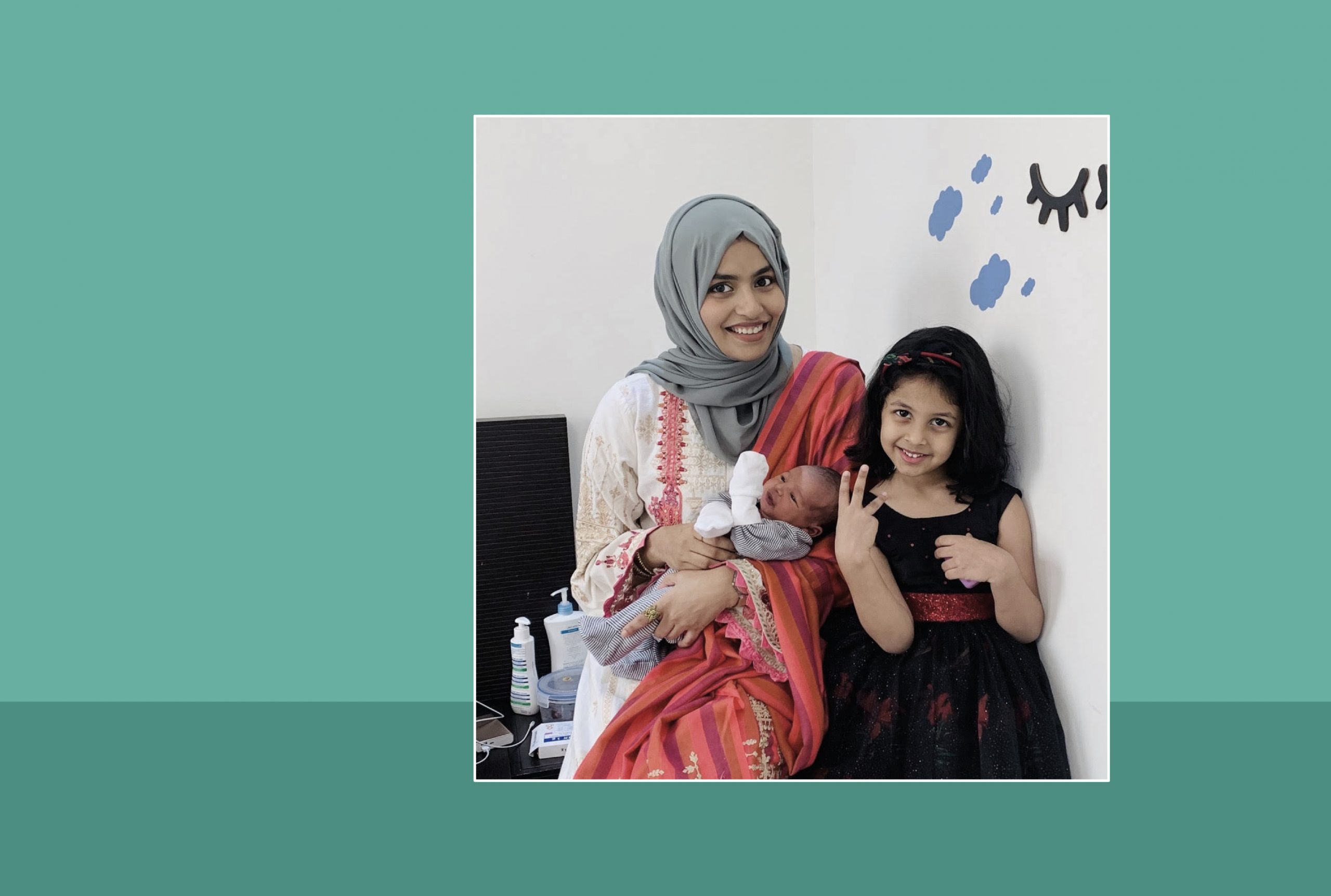 Image of Nusreen Moideen with her daughter and son