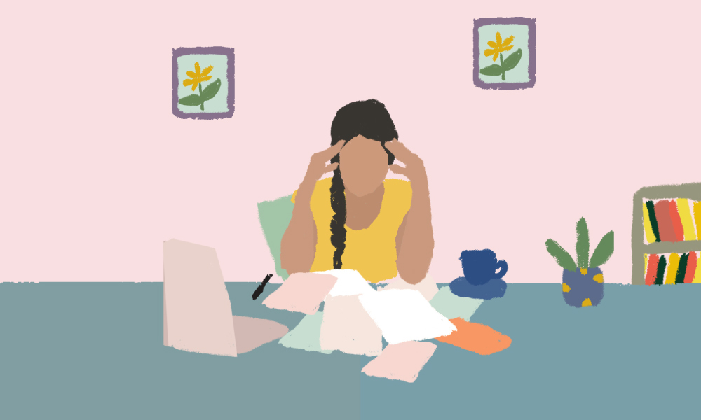 An illustration of a girl sitting at a table looking frustrated and being surrounded by books and papers.