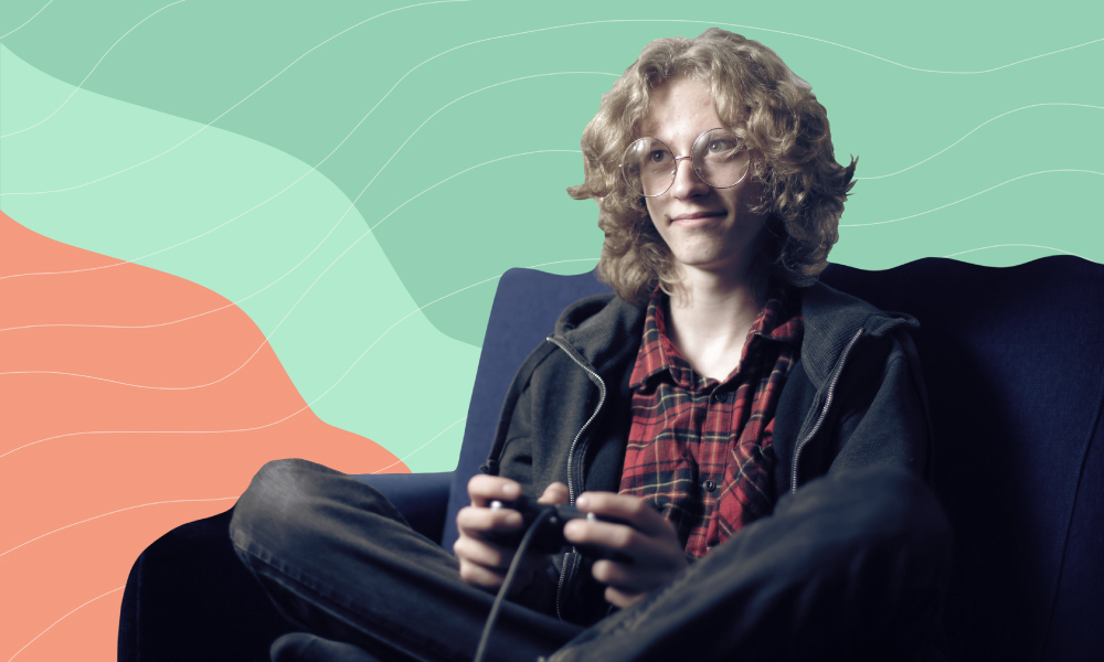 An image of a blonde-haired teen playing video games
